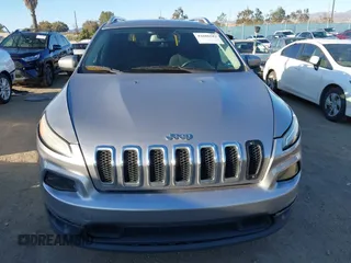 2016 Jeep Cherokee Latitude with VIN 1C4PJMCBXGW118161, listed as a IAAI auction lot 41686583 with 183,431 mi miles. Bid and sale history available at carsss.com. Image 12.