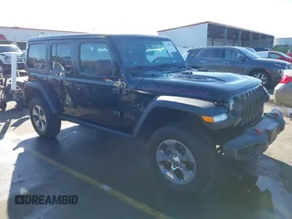 2020 Jeep Wrangler Unlimited Rubicon z VIN 1C4HJXFN4LW283872, wystawiony jako IAAI lot #41340974 z przebiegiem 72 181 mil mil oraz . Historia ofert i sprzedaży dostępna na DreamBid. Obrazek 1.