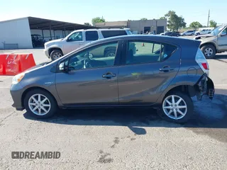2014 Toyota Prius One z VIN JTDKDTB39E1078879, wystawiony jako IAAI lot #42201010 z przebiegiem 147 544 mil mil oraz . Historia ofert i sprzedaży dostępna na DreamBid. Obrazek 14.