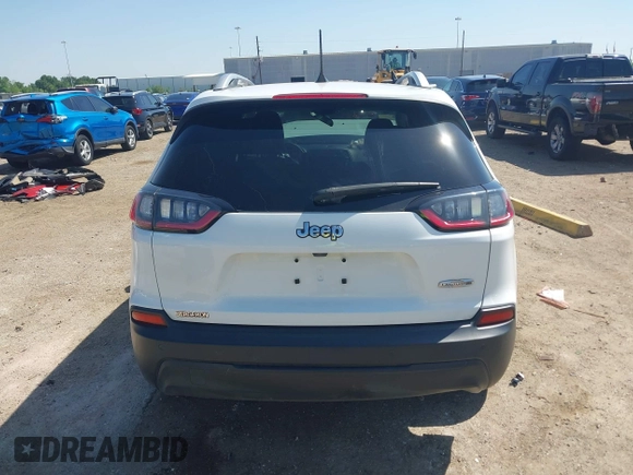 2019 Jeep Cherokee Latitude Plus with VIN 1C4PJLLB4KD455861, listed as a IAAI auction lot 41975695 with 104,413 mi miles. Bid and sale history available at carsss.com. Image 16.