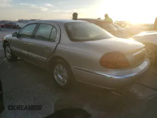 2000 Lincoln Continental with VIN 1LNHM97V3YY920453, listed as a Copart auction lot 76306424 with 117,912 mi miles and Non Repairable. Bid and sale history available at carsss.com. Image 2.