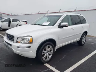 2014 Volvo XC90 with VIN YV4952CZ4E1680532, listed as a IAAI auction lot 40978944 with 94,525 mi miles and . Bid and sale history available at DreamBid. Image 2.