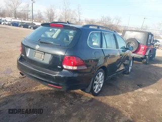 2012 Volkswagen Jetta SportWagen TDI with VIN 3VWPL7AJ8CM702152, listed as a IAAI auction lot 41770833 with 129,621 mi miles. Bid and sale history available at carsss.com. Image 4.