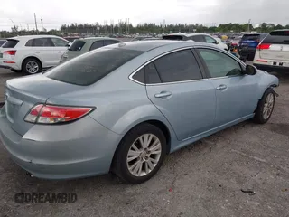 2009 Mazda 6 i Touring with VIN 1YVHP82AX95M19535, listed as a IAAI auction lot 41987285 with 129,111 mi miles and . Bid and sale history available at carsss.com. Image 4.
