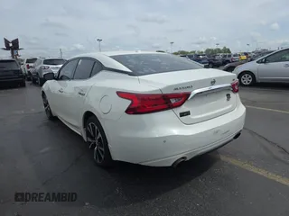 2018 Nissan Maxima SL z VIN 1N4AA6AP2JC371232, wystawiony jako Copart lot #54703405 z przebiegiem 142 447 mil mil oraz Czysty tytuł • Clean title. Historia ofert i sprzedaży dostępna na DreamBid. Obrazek 3.