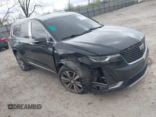 2021 Cadillac XT6 Premium Luxury with VIN 1GYKPDRS2MZ141406, listed as a IAAI auction lot 42014495 with 62,929 mi miles and . Bid and sale history available at DreamBid. Image 1.