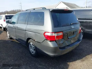 2007 Honda Odyssey EX-L with VIN 5FNRL38717B070328, listed as a IAAI auction lot 41696829 with 171,229 mi miles. Bid and sale history available at carsss.com. Image 6.
