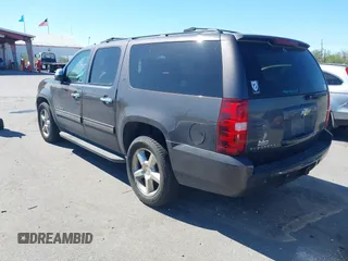 2011 Chevrolet Suburban LT with VIN 1GNSCJE03BR255374, listed as a IAAI auction lot 41826513 with 279,698 mi miles. Bid and sale history available at carsss.com. Image 3.