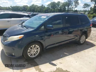 2012 Toyota Sienna XLE AAS with VIN 5TDYK3DC6CS224572, listed as a Copart auction lot 61209825 with 176,451 mi miles and Salvage title. Bid and sale history available at DreamBid. Image 1.