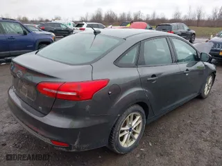 2018 Ford Focus SE with VIN 1FADP3F23JL298265, listed as a IAAI auction lot 42005754 with 134,721 mi miles. Bid and sale history available at carsss.com. Image 4.