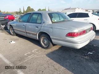 1994 Mercury Grand Marquis LS z VIN 2MELM75W9RX669484, wystawiony jako IAAI lot #41838499 z przebiegiem 101 777 mil mil oraz . Historia ofert i sprzedaży dostępna na DreamBid. Obrazek 3.