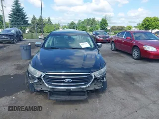 2014 Ford Taurus Limited z VIN 1FAHP2F85EG125118, wystawiony jako IAAI lot #42457437 z przebiegiem 129 406 mil mil oraz . Historia ofert i sprzedaży dostępna na DreamBid. Obrazek 12.