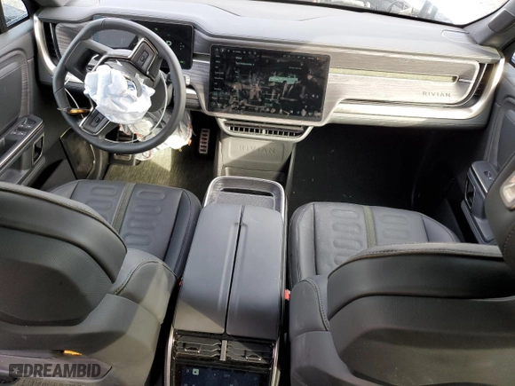 2023 Rivian R1S Adventure with VIN 7PDSGABAXPN019516, listed as a Copart auction lot 73248104 with 11,525 mi miles and Salvage Title. Bid and sale history available at carsss.com. Image 8.