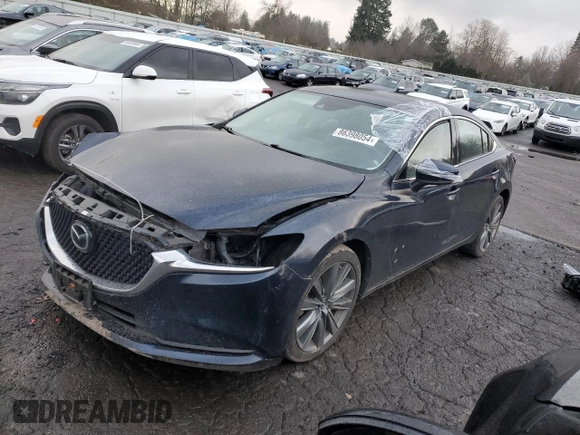 2020 Mazda 6 Grand Touring with VIN JM1GL1TY3L1513321, listed as a Copart auction lot 86398054 with 57,407 mi miles and Salvage Title. Bid and sale history available at DreamBid. Image 1.
