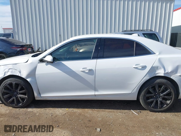 2014 Chevrolet Malibu LT with VIN 1G11E5SL3EU127618, listed as a IAAI auction lot 41322518 with 145,369 mi miles and . Bid and sale history available at DreamBid. Image 14.
