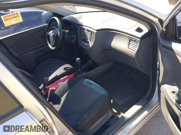 2008 Kia Rio LX with VIN KNADE123X86329097, listed as a IAAI auction lot 41822420 with 180,462 mi miles. Bid and sale history available at carsss.com. Image 5.