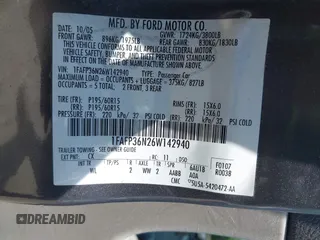 2006 Ford Focus SE with VIN 1FAFP36N26W142940, listed as a IAAI auction lot 42660208 with 139,341 mi miles and . Bid and sale history available at DreamBid. Image 9.