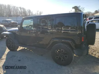 2018 Jeep Wrangler JK Unlimited Sahara with VIN 1C4BJWEG1JL890913, listed as a Copart auction lot 41367695 with 62,521 mi miles and Salvage Title. Bid and sale history available at carsss.com. Image 2.