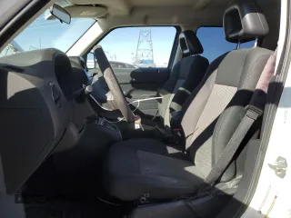 2009 Jeep Patriot Sport with VIN 1J4FT28A29D126337, listed as a Copart auction lot 46438905 with 150,111 mi miles and Salvage Title. Bid and sale history available at DreamBid. Image 7.