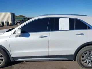 2020 Cadillac XT4 AWD Premium Luxury z VIN 1GYFZDR46LF083118, wystawiony jako IAAI lot #40495567 z przebiegiem 83 224 mil mil oraz . Historia ofert i sprzedaży dostępna na DreamBid. Obrazek 14.