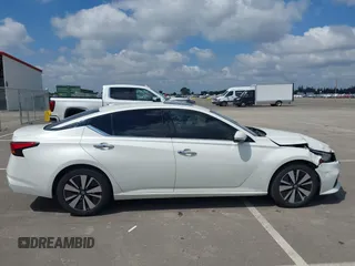 2019 Nissan Altima SL with VIN 1N4BL4EV9KC103050, listed as a IAAI auction lot 42139670 with 112,427 mi miles and . Bid and sale history available at DreamBid. Image 13.