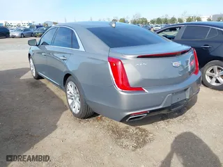 2019 Cadillac XTS Luxury with VIN 2G61M5S35K9125097, listed as a IAAI auction lot 41749076 with 102,585 mi miles. Bid and sale history available at carsss.com. Image 3.