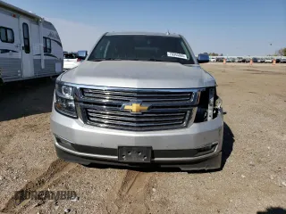 2017 Chevrolet Suburban Premier with VIN 1GNSKJKC4HR316953, listed as a Copart auction lot 76944884 with 105,753 mi miles and Salvage Title. Bid and sale history available at DreamBid. Image 5.