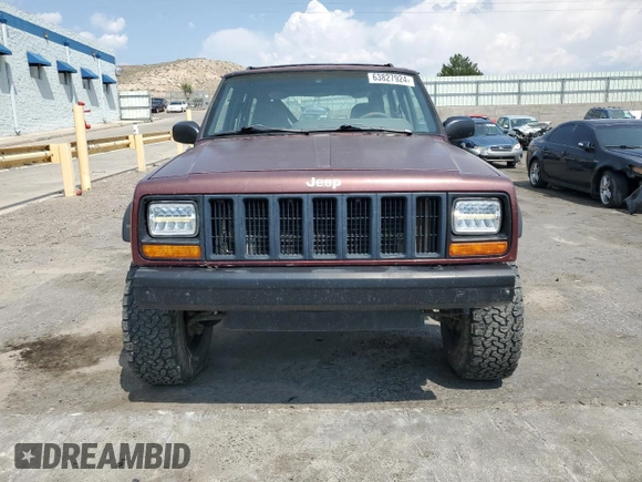 2000 Jeep Cherokee SE with VIN 1J4FF28S9YL133208, listed as a Copart auction lot 63827924 with 0 mi miles and Salvage Title. Bid and sale history available at carsss.com. Image 5.