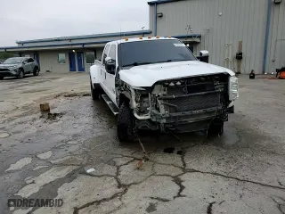 2016 Ford Super Duty F-350 DRW Lariat with VIN 1FT8W3DT0GED38695, listed as a Copart auction lot 44690395 with 123,485 mi miles and Salvage Title. Bid and sale history available at carsss.com. Image 14.