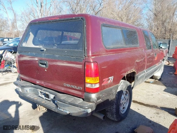 1999 Chevrolet Silverado 1500 LS with VIN 1GCEK19T1XE122222, listed as a IAAI auction lot 41753362 with 130,618 mi miles. Bid and sale history available at carsss.com. Image 4.