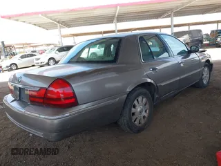 2003 Mercury Grand Marquis LS Premium with VIN 2MEFM75W23X613004, listed as a IAAI auction lot 41974625 with 151,023 mi miles and . Bid and sale history available at DreamBid. Image 4.