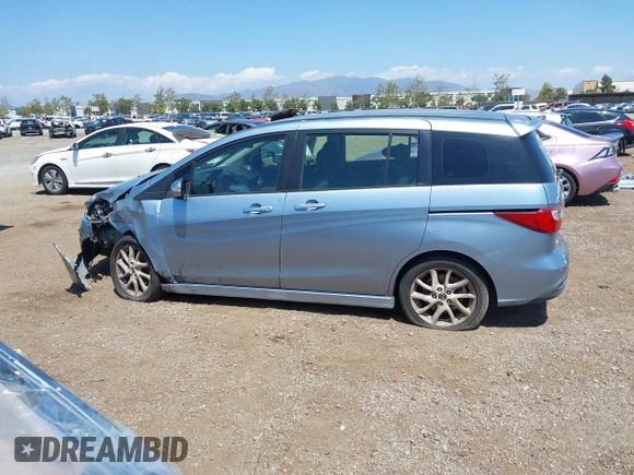 2013 Mazda 5 Touring with VIN JM1CW2CL8D0145628, listed as a IAAI auction lot 42148184 with 137,150 mi miles and . Bid and sale history available at DreamBid. Image 14.
