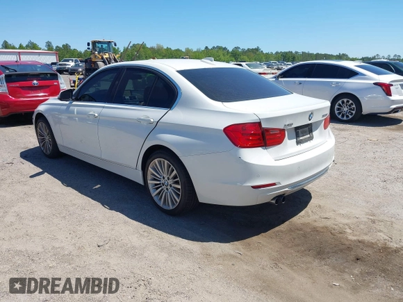 2013 BMW 3 Series 328i xDrive with VIN WBA3B5C51DJ599144, listed as a IAAI auction lot 42059260 with 84,153 mi miles. Bid and sale history available at carsss.com. Image 3.