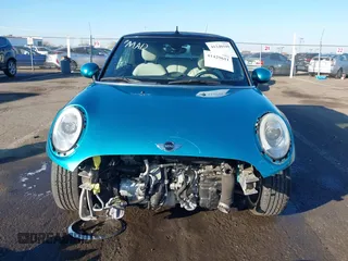2016 MINI Convertible z VIN WMWWG5C50G3C19656, wystawiony jako IAAI lot #41429611 z przebiegiem 60 873 mil mil oraz . Historia ofert i sprzedaży dostępna na DreamBid. Obrazek 6.