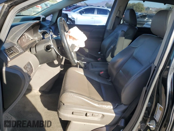 2012 Honda Odyssey EX-L with VIN 5FNRL5H64CB052869, listed as a Copart auction lot 47685375 with 168,449 mi miles and Salvage Title. Bid and sale history available at DreamBid. Image 7.