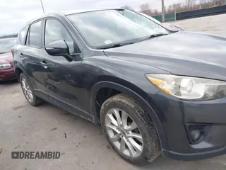 2015 Mazda CX-5 Grand Touring with VIN JM3KE4DY0F0479229, listed as a IAAI auction lot 41838381 with 139,843 mi miles. Bid and sale history available at carsss.com. Image 13.