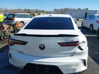 2022 Acura TLX w/A-Spec Package with VIN 19UUB6F52NA002062, listed as a IAAI auction lot 41853469 with 77,301 mi miles and . Bid and sale history available at DreamBid. Image 16.