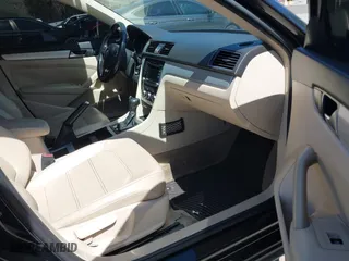 2012 Volkswagen Passat SE with VIN 1VWBP7A30CC025468, listed as a IAAI auction lot 41817638 with 204,508 mi miles. Bid and sale history available at carsss.com. Image 5.