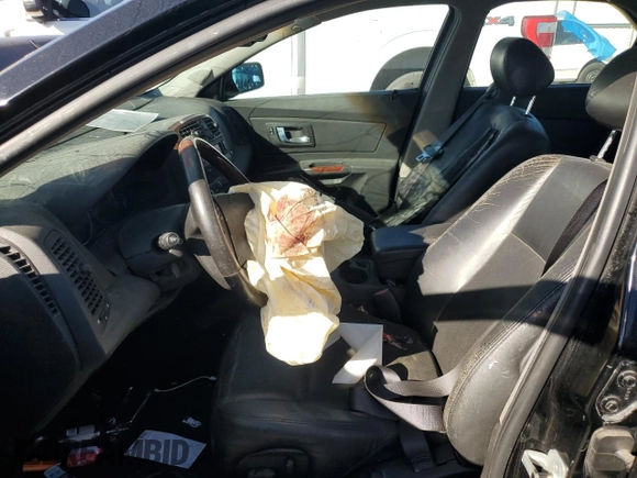 2006 Cadillac CTS with VIN 1G6DP577560194372, listed as a Copart auction lot 75014874 with 0 mi miles and Salvage Title. Bid and sale history available at carsss.com. Image 7.