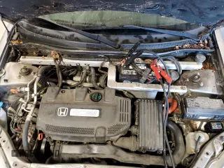 2001 Honda Insight z VIN JHMZE13741T000153, wystawiony jako Copart lot #42403595 z przebiegiem 207 491 mil mil oraz Szkoda całkowita • Salvage title. Historia ofert i sprzedaży dostępna na DreamBid. Obrazek 11.