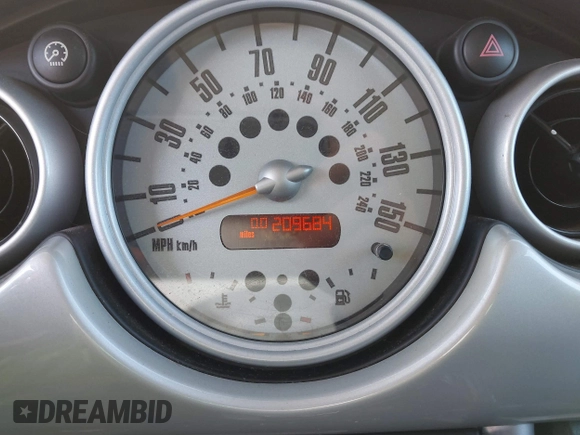 2003 MINI Hardtop with VIN WMWRC33433TE14150, listed as a IAAI auction lot 41313860 with 209,684 mi miles and . Bid and sale history available at DreamBid. Image 7.
