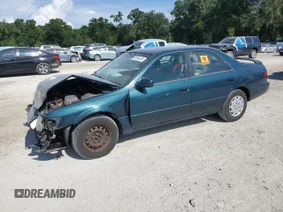 1997 Toyota Camry LE with VIN 4T1BG22K4VU007883, listed as a Copart auction lot 61546345 with 182,469 mi miles and Salvage title. Bid and sale history available at DreamBid. Image 1.