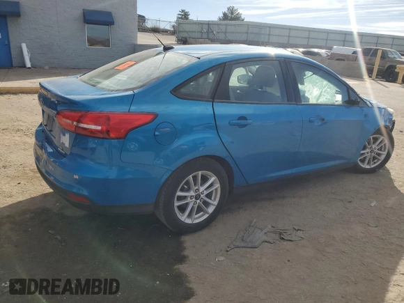 2016 Ford Focus SE with VIN 1FADP3F23GL212607, listed as a Copart auction lot 86732334 with 36,607 mi miles and Salvage title. Bid and sale history available at DreamBid. Image 3.