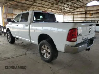 2014 Ram 2500 SLT with VIN 3C6TR5DT0EG309756, listed as a Copart auction lot 51149685 with 163,472 mi miles and Salvage title. Bid and sale history available at DreamBid. Image 2.
