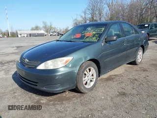 2004 Toyota Camry LE with VIN 4T1BF32K04U074276, listed as a IAAI auction lot 41940050 with 266,420 mi miles and . Bid and sale history available at DreamBid. Image 2.