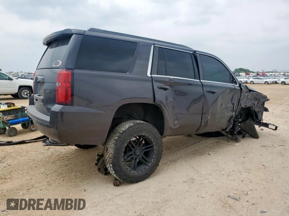 2015 Chevrolet Tahoe LT with VIN 1GNSKBKC1FR139281, listed as a Copart auction lot 57583595 with 142,090 mi miles and Salvage title. Bid and sale history available at DreamBid. Image 3.