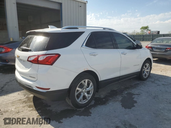 2020 Chevrolet Equinox Premier z VIN 2GNAXNEV5L6201364, wystawiony jako Copart lot #53293525 z przebiegiem Nie podano mil oraz Szkoda całkowita • Salvage title. Historia ofert i sprzedaży dostępna na DreamBid. Obrazek 3.