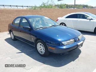 1998 Saturn SL z VIN 1G8ZK5270WZ174447, wystawiony jako IAAI lot #42543578 z przebiegiem 137 326 mil mil oraz . Historia ofert i sprzedaży dostępna na DreamBid. Obrazek 1.