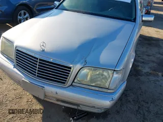 1996 Mercedes-Benz S 320 with VIN WDBGA32E9TA307279, listed as a IAAI auction lot 41631747 with 189,048 mi miles and . Bid and sale history available at DreamBid. Image 6.