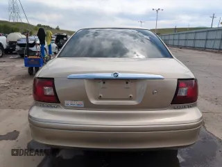 2001 Mercury Sable LS Premium with VIN 1MEHM55S51A604989, listed as a Copart auction lot 57890935 with 113,793 mi miles and Salvage title. Bid and sale history available at DreamBid. Image 6.